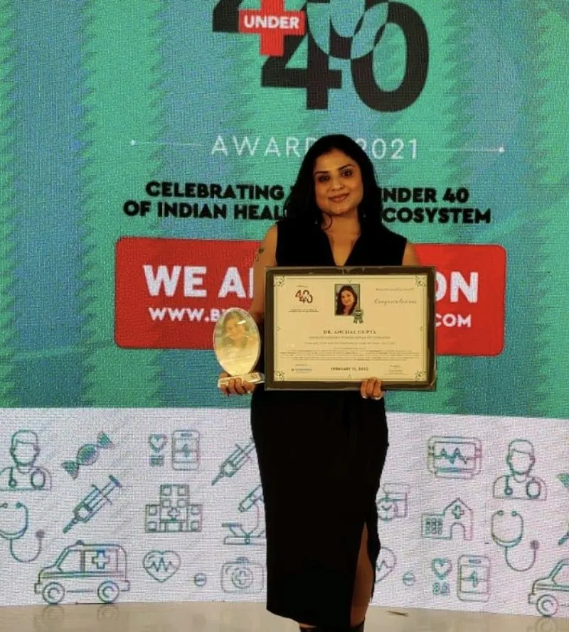 Dr. Anchal Gupta with the BW Healthcare 40 Under 40 certificate and trophy